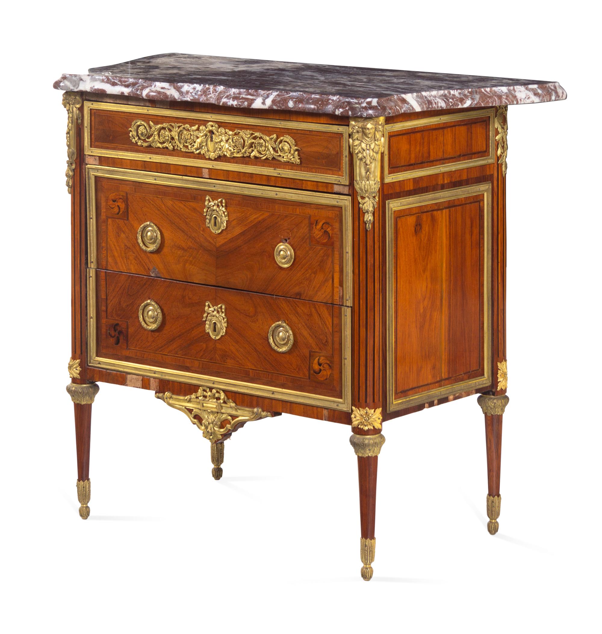 A Louis XVI Gilt Bronze Mounted Tulipwood Commode with an Unassociated Marble Top