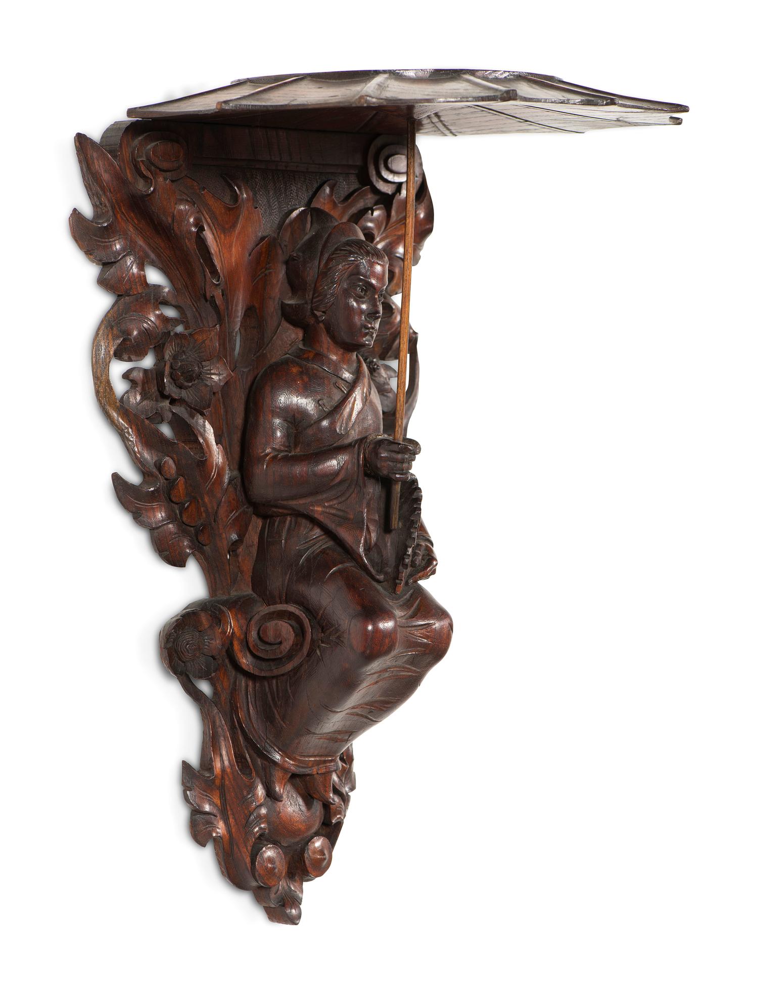 A Pair of Carved Oak Figural Wall Brackets