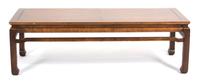 An Asian Style Mahogany Coffee Table Height 17 x width 59 x depth 22 inches. — 20TH CENTURY