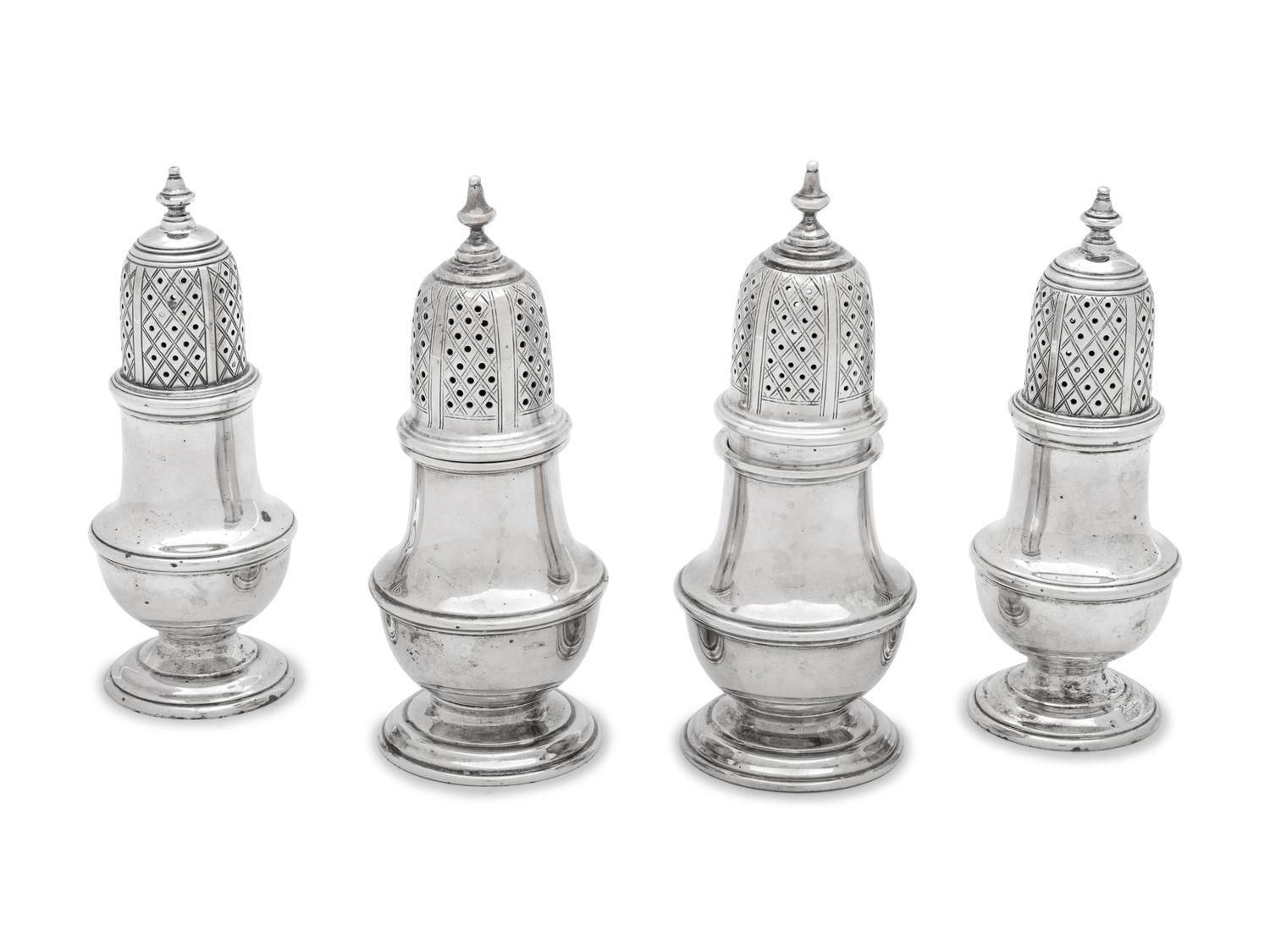 each of typical baluster form, comprising a pair marked for C.J. Vander Ltd., London, 1962 and another example marked 'Sterling' .