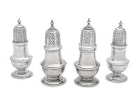 each of typical baluster form, comprising a pair marked for C.J. Vander Ltd., London, 1962 and another example marked 'Sterling' .