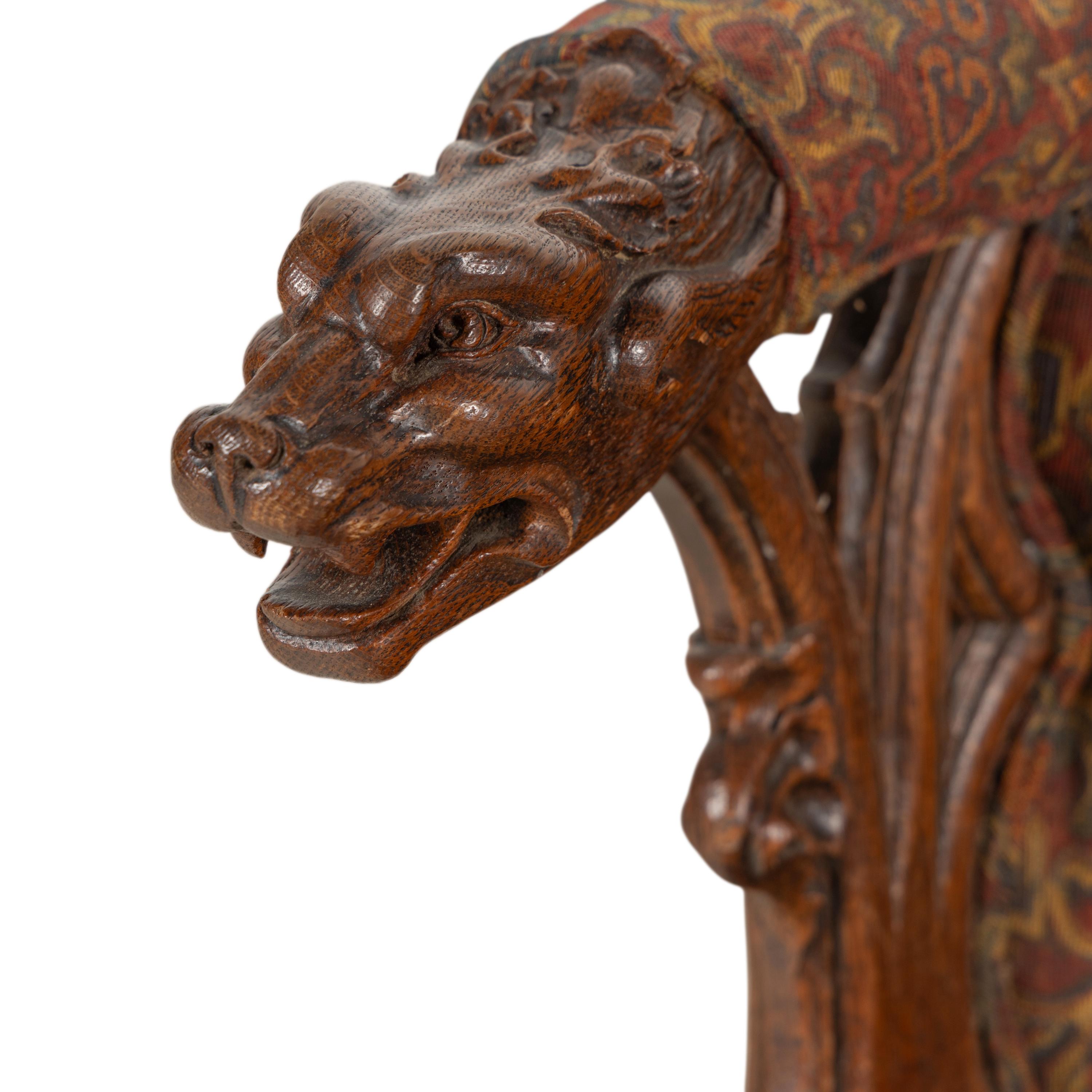 A French or Italian Gothic Revival Carved Oak Armchair