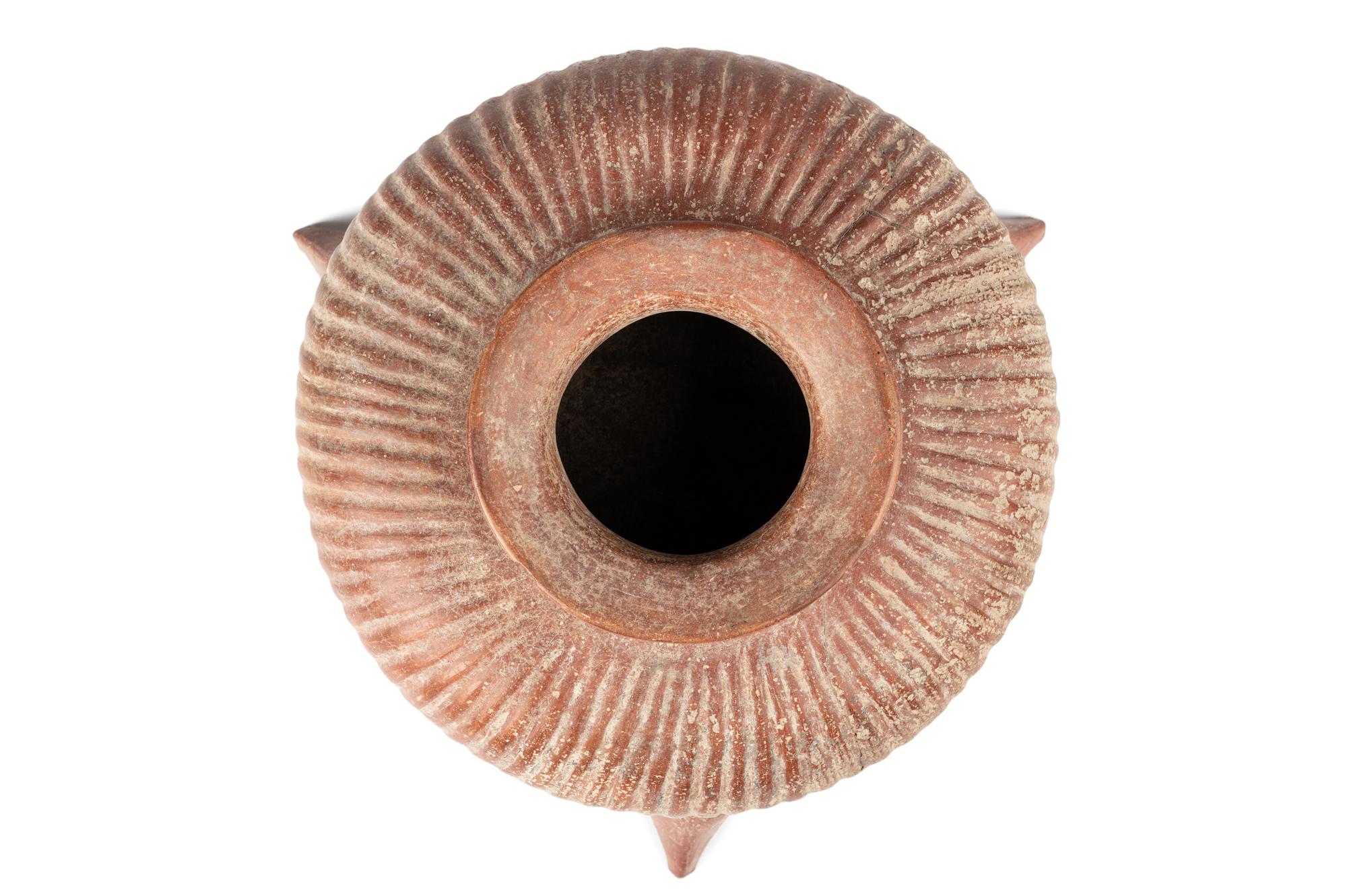A Colima Gadrooned Vessel with Shark Feet