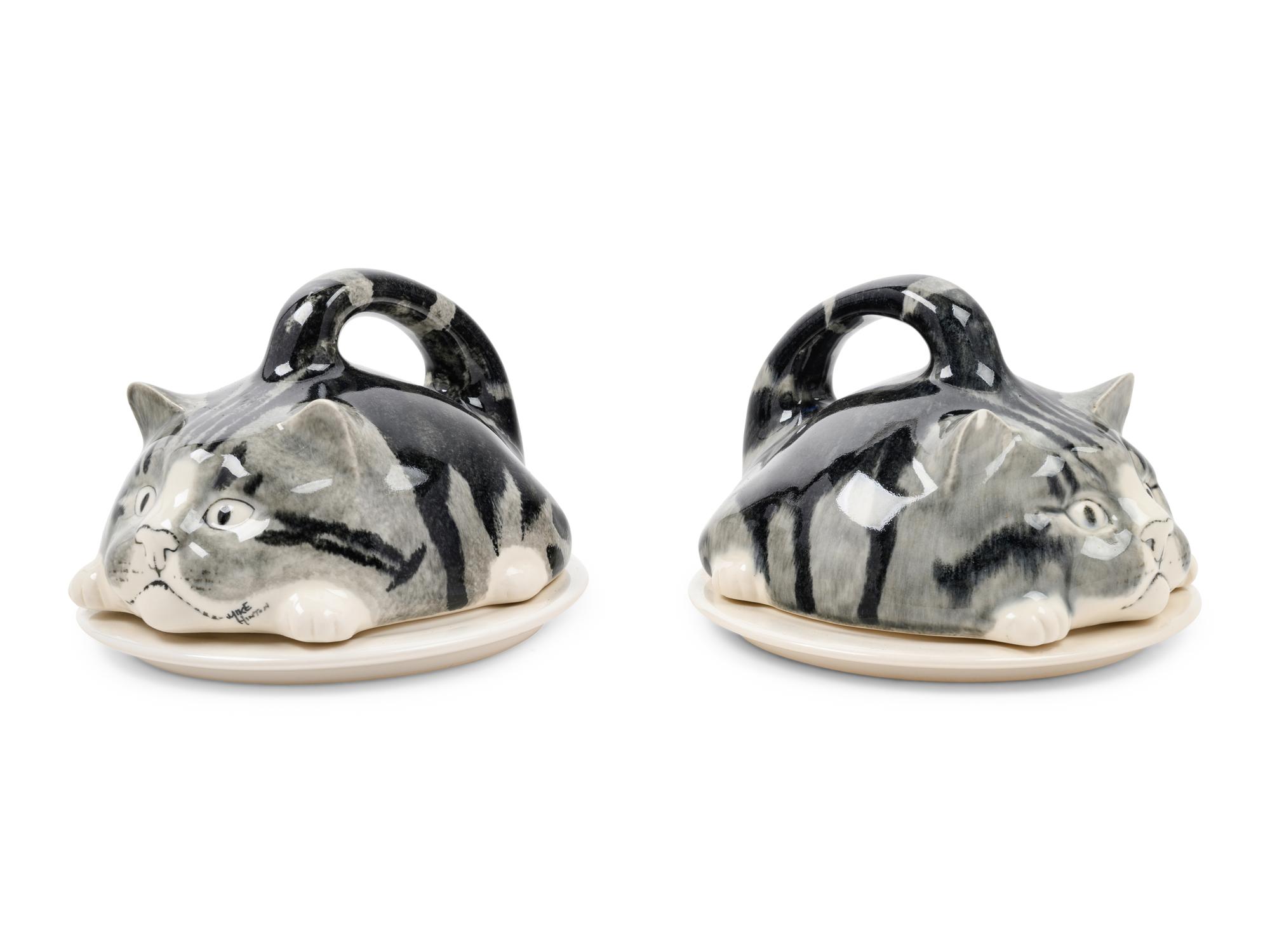 A Pair of Ceramic Figural Butter Dishes and Covers