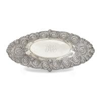 An American Aesthetic Movement Silver Repousse Bread Dish