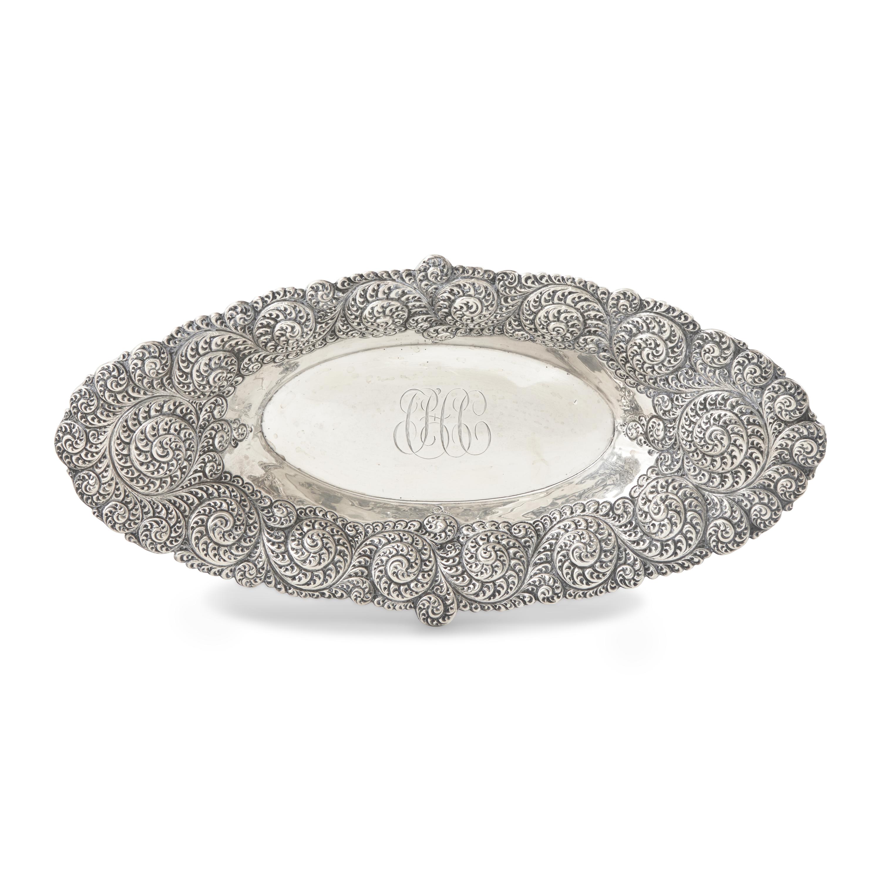 An American Aesthetic Movement Silver Repousse Bread Dish