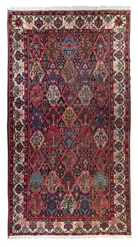 A Bakhtiari Wool Rug 15 feet 10 inches x 10 feet 4 inches. — FIRST HALF 20TH CENTURY