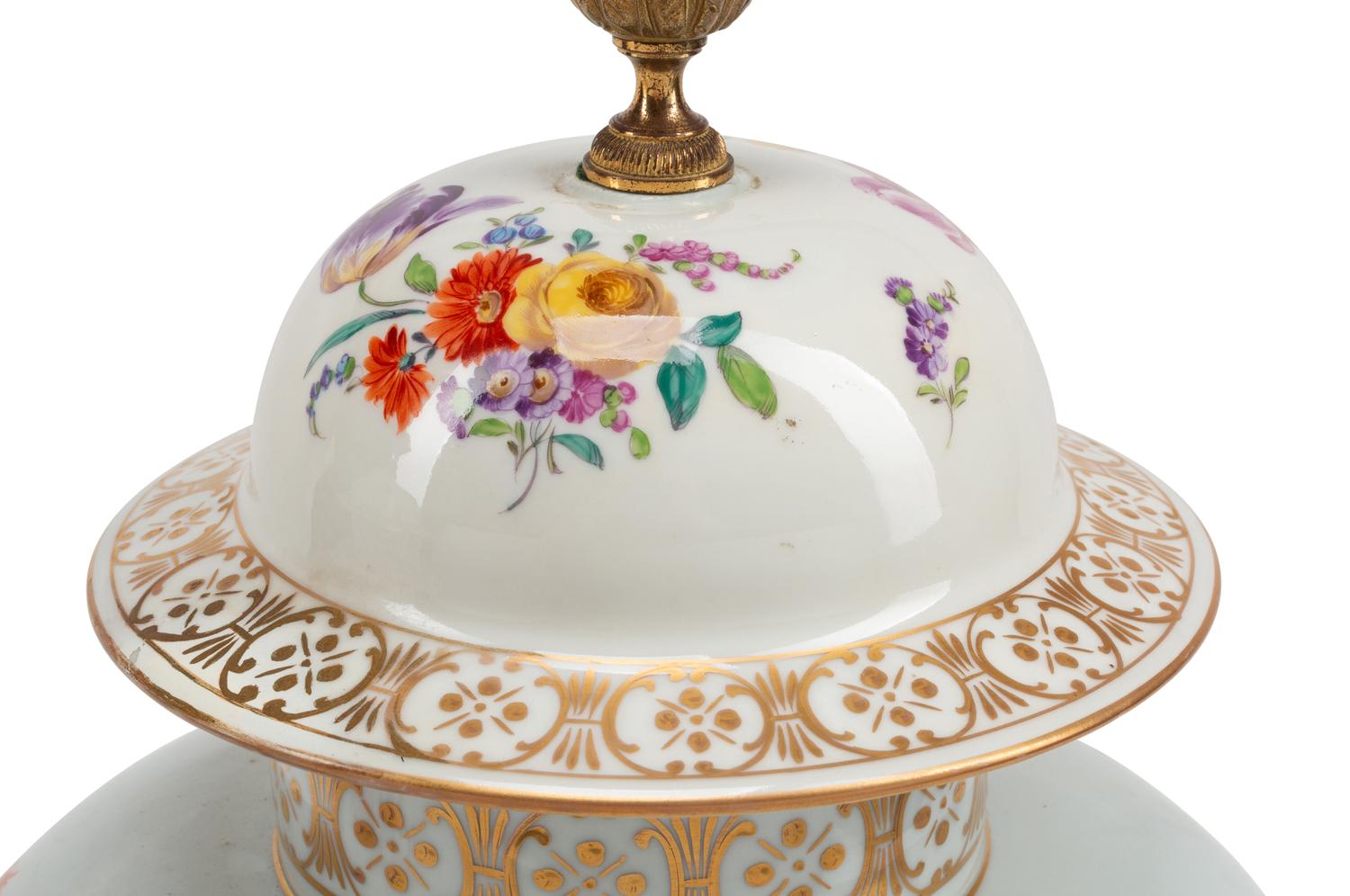 A Pair of Continental Gilt Bronze Mounted Porcelain Jars