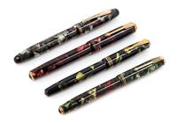 A Group of Four Vintage Parker Fountain Pens Length of first 4 3/4 inches.