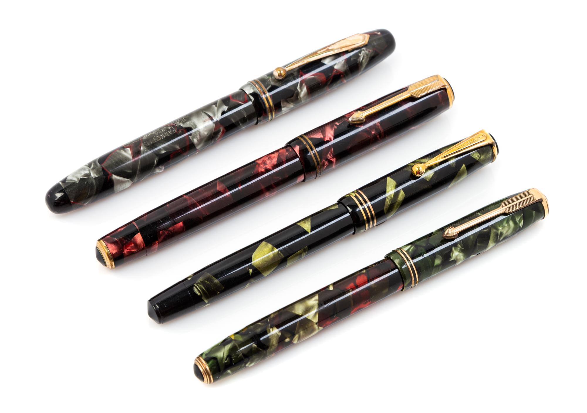 A Group of Four Vintage Parker Fountain Pens Length of first 4 3/4 inches.