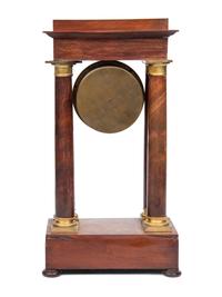A Charles X Gilt Bronze Mounted Mahogany Portico Clock