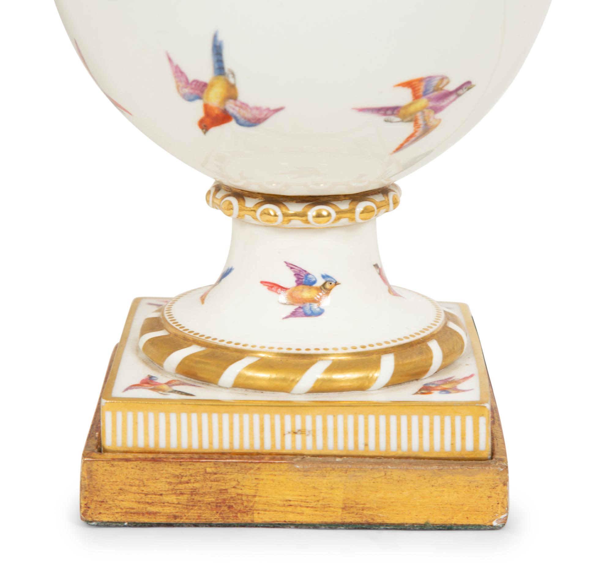 A Pair of Parcel-Gilt Painted Porcelain Table Lamps