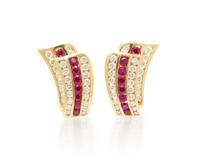 A Pair of 14 Karat Yellow Gold, Ruby and Diamond Earclips, 6.60 dwts.