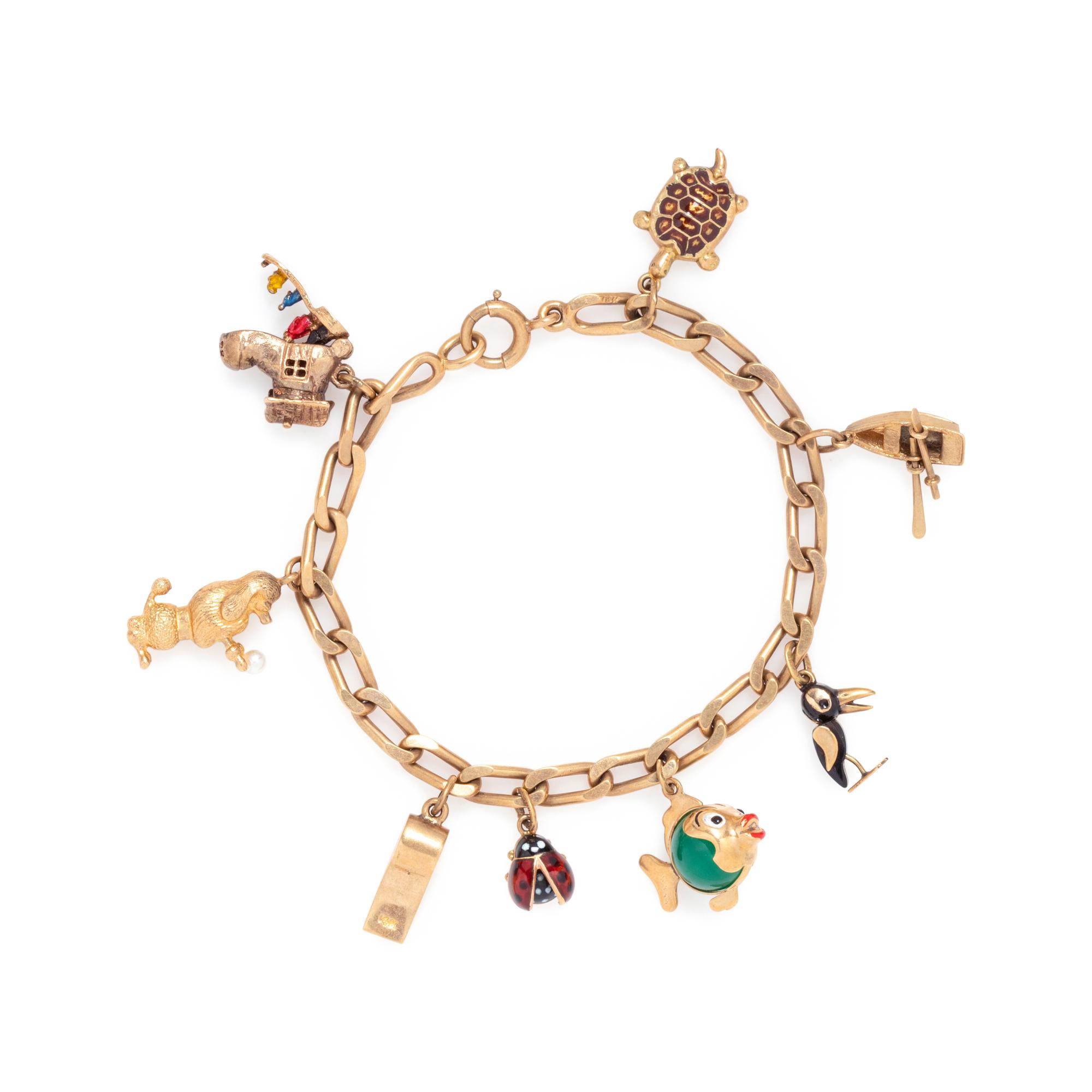 YELLOW GOLD CHARM BRACELET