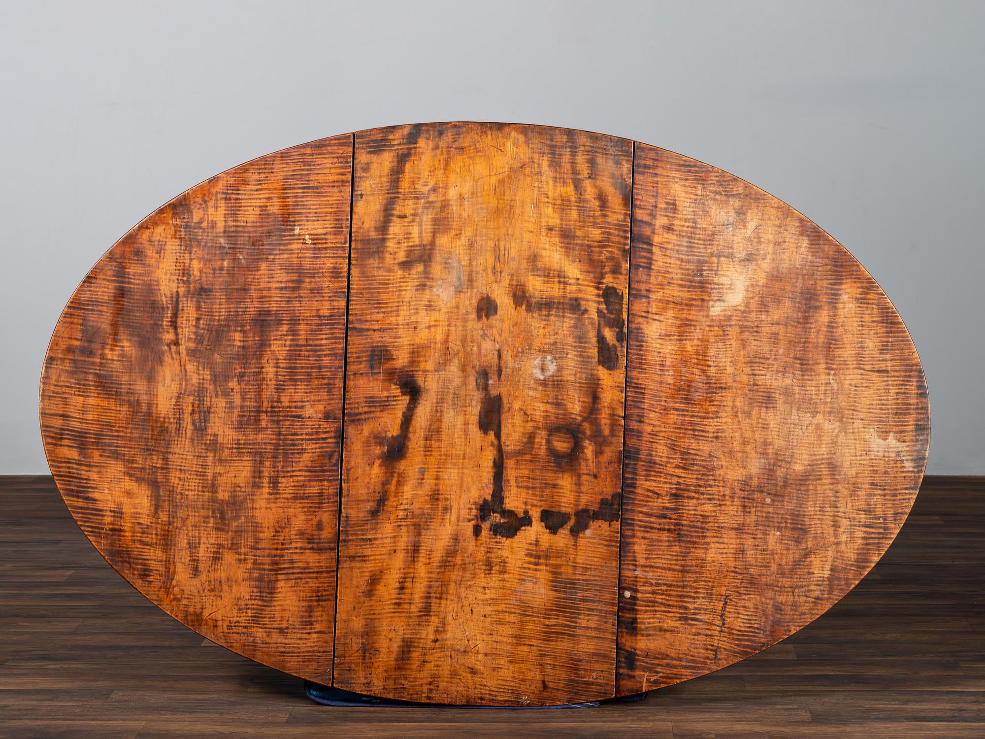 A William and Mary Figured Maple Drop Leaf Dining Table