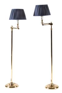 A Pair of Brass Swing-Arm Floor Lamps Height overall 48 1/2 inches. — 20TH CENTURY