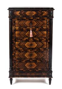 A French Parquetry Chest of Drawers, Height 55 1/2 x width 33 1/2 x depth 19 inches.