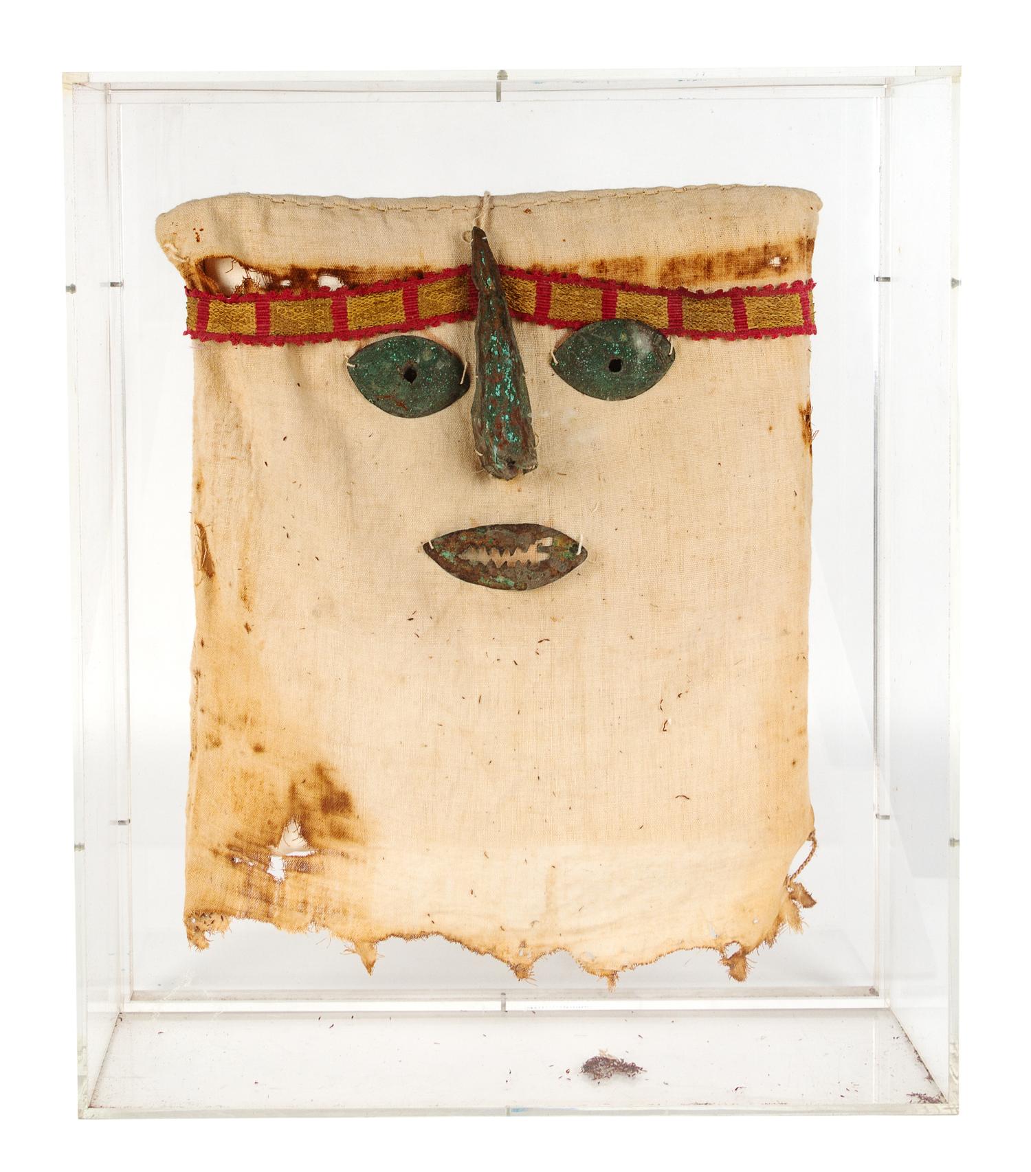A Pre-Columbian Fabric and Silver Large Mummy False Head Height 24 1/2 x width 25 1/2 x depth 6 inches. — Chancay, Peru, circa 1000-1470 CE