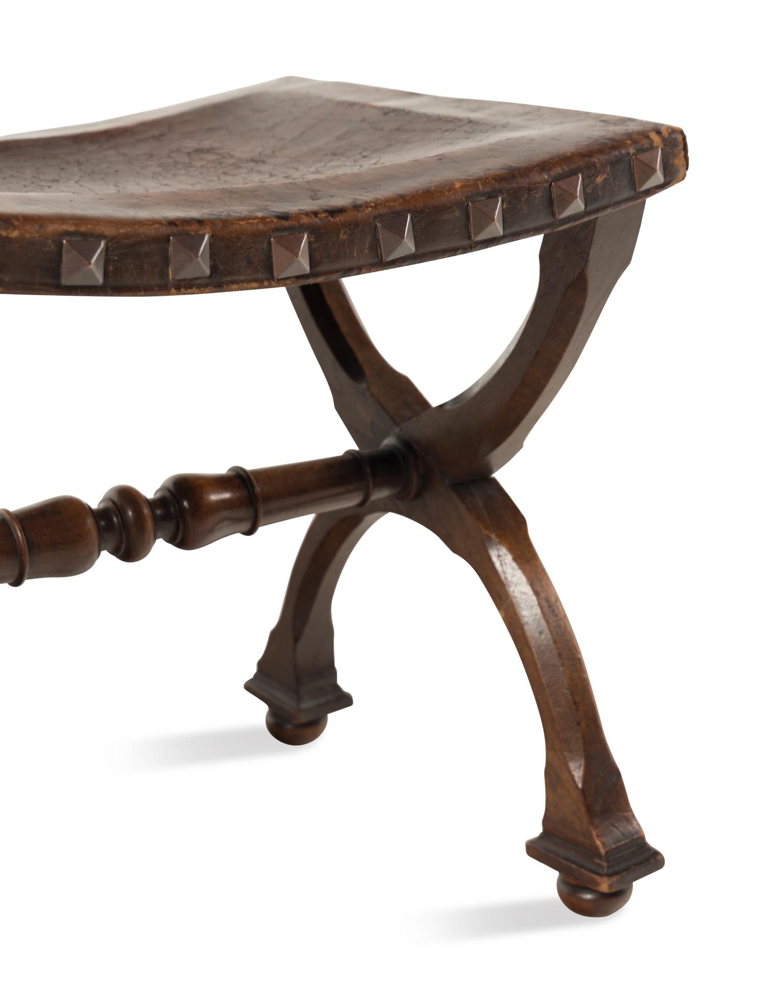 A Pair of Spanish Leather Stools
