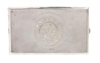 A Mexican Silver Cigarette Case, 20th Century, engraved with an Aztec style medallion on the cover.