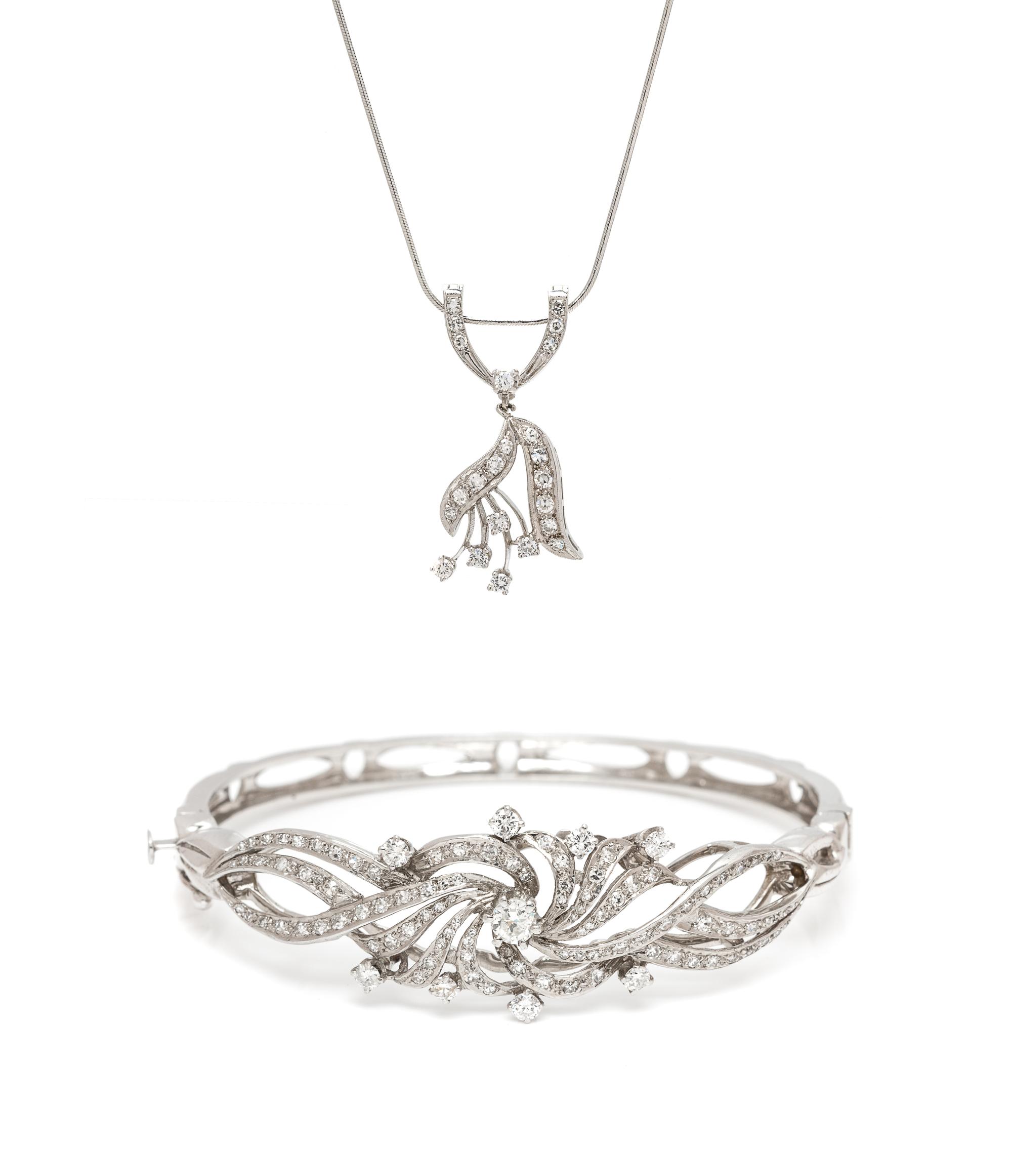 A Collection of 14 Karat White Gold and Diamond Jewelry, 16.10 dwts.