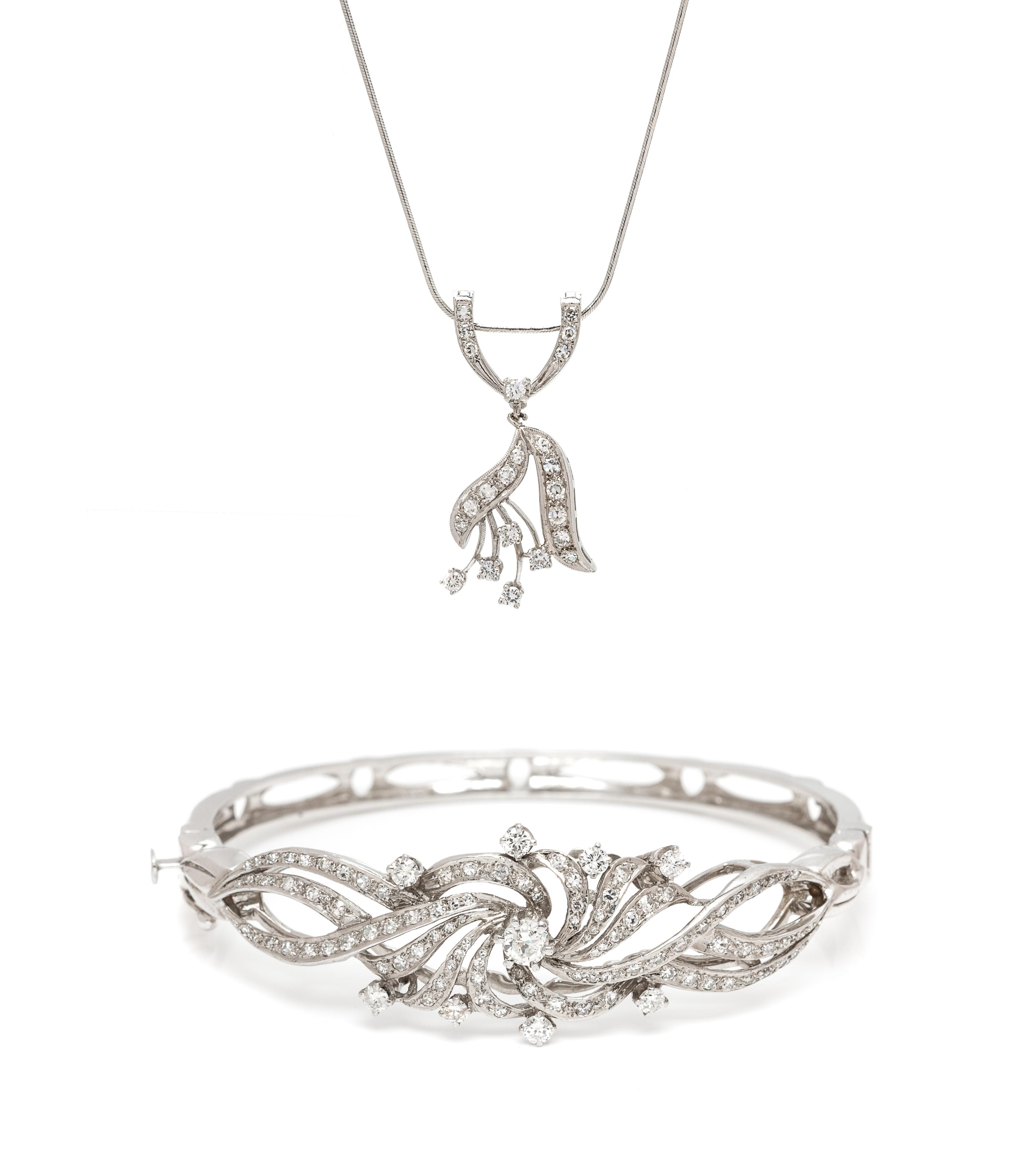 A Collection of 14 Karat White Gold and Diamond Jewelry, 16.10 dwts.