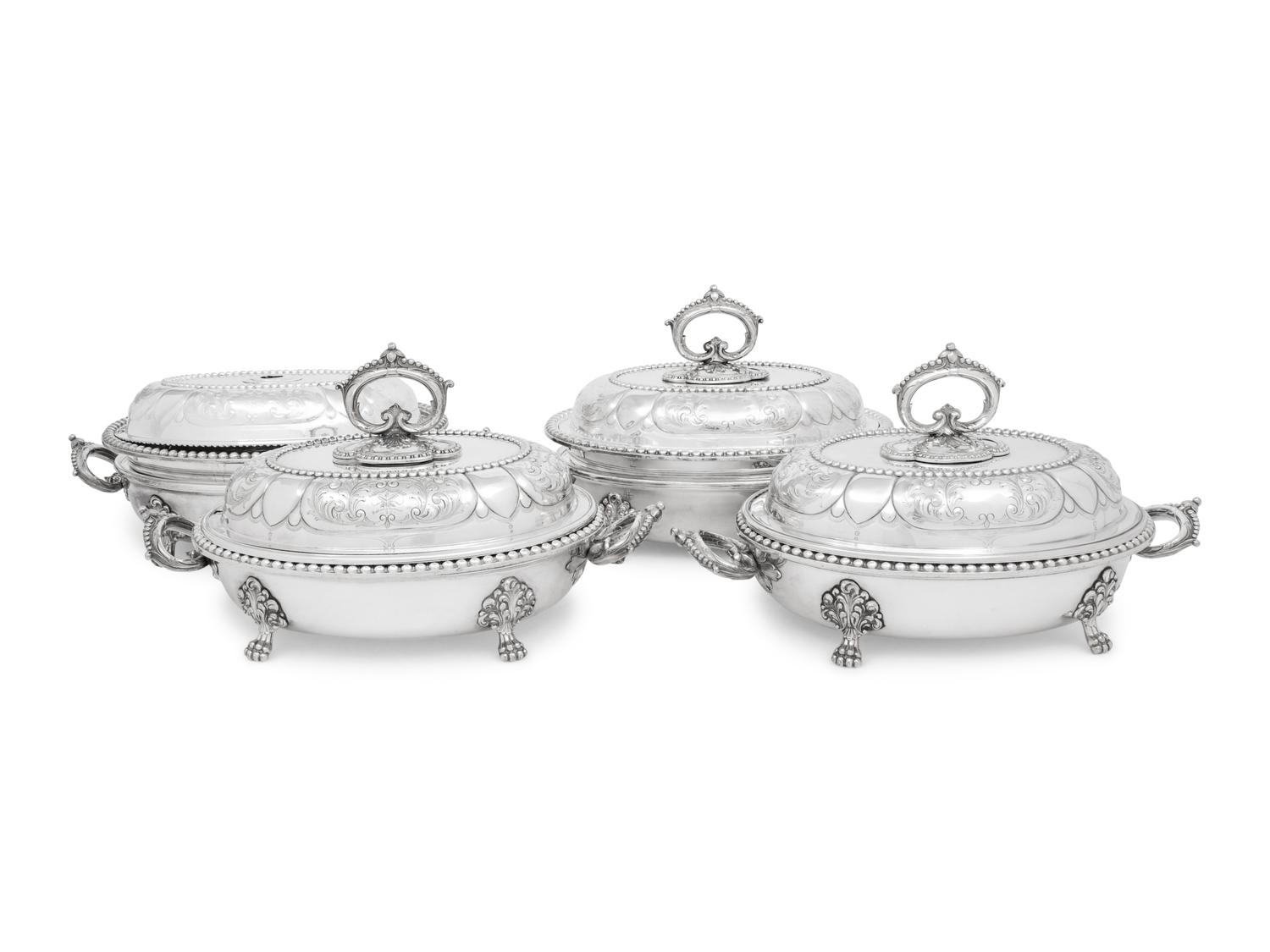 A Set of Four Victorian Silver-Plate Oval Vegetable Dishes with Covers and Liners