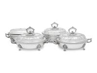 A Set of Four Victorian Silver-Plate Oval Vegetable Dishes with Covers and Liners