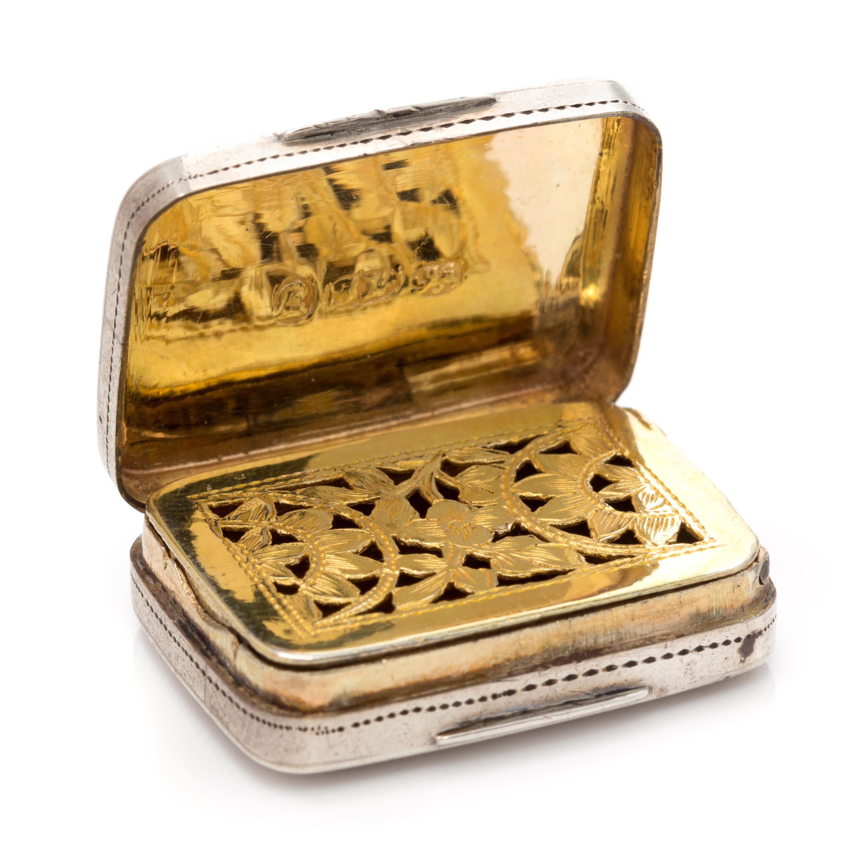 A George III Silver Vinaigrette, Samuel Pemberton, Birmingham, 1790, the lid centered with two birds atop a floral spray.