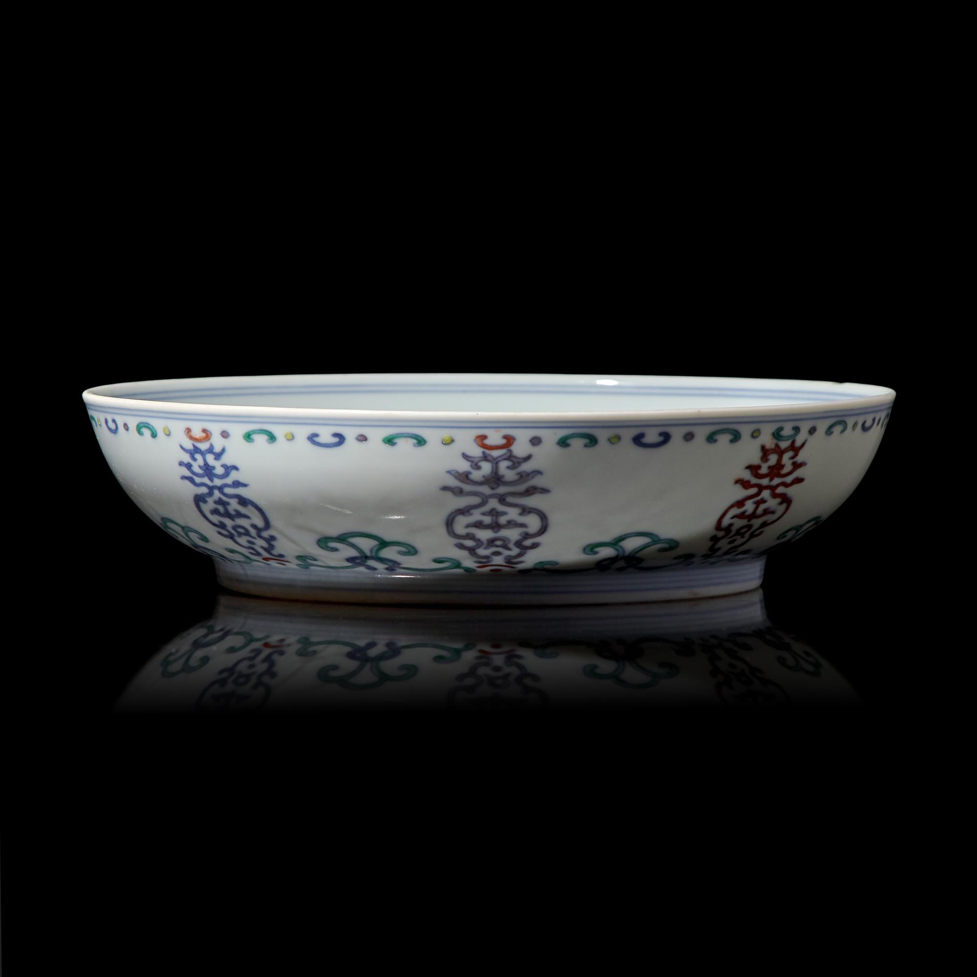 A Chinese Doucai Porcelain 'Shou' Dish, Daoguang Mark and Period 清道光 斗彩壽字紋盤