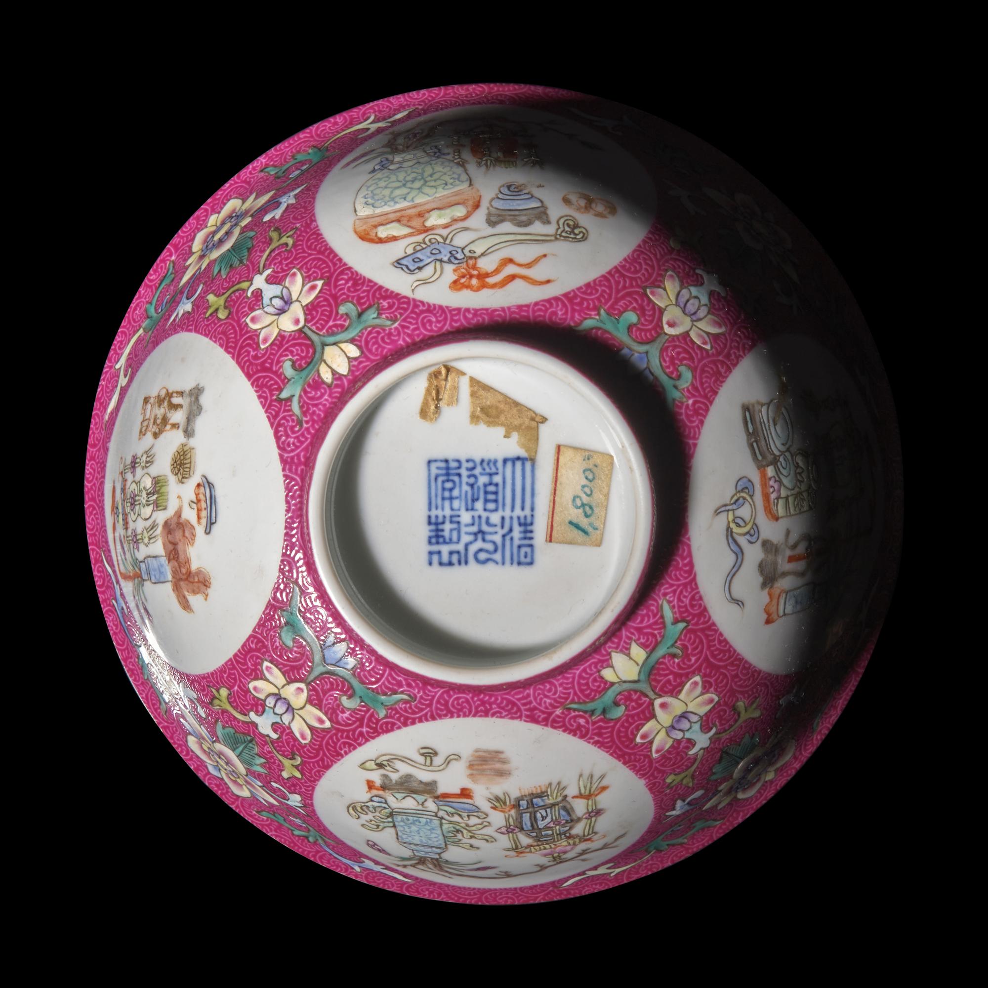 A Chinese Famille Rose Ruby-Ground Sgraffito 'Medallion' Bowl, Late 19th/Early 20th Century — 晚清/民國 內青花外粉彩軋道胭脂紅地開光五穀豐登博古紋碗