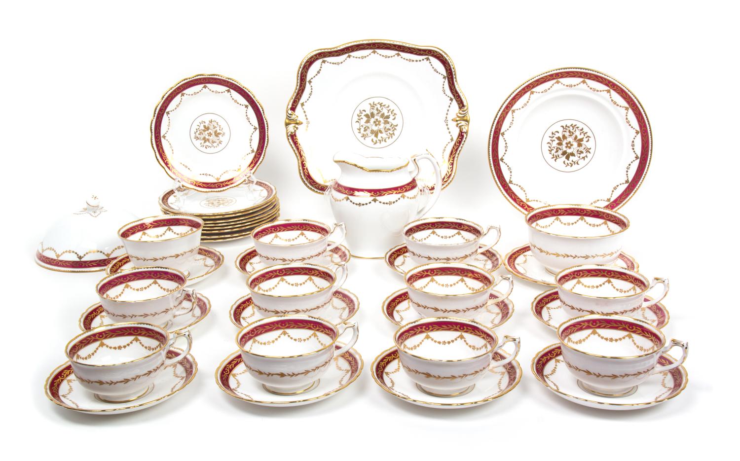 A Porcelain Partial Dinner Service Length of serving dish 9 3/4 inches.