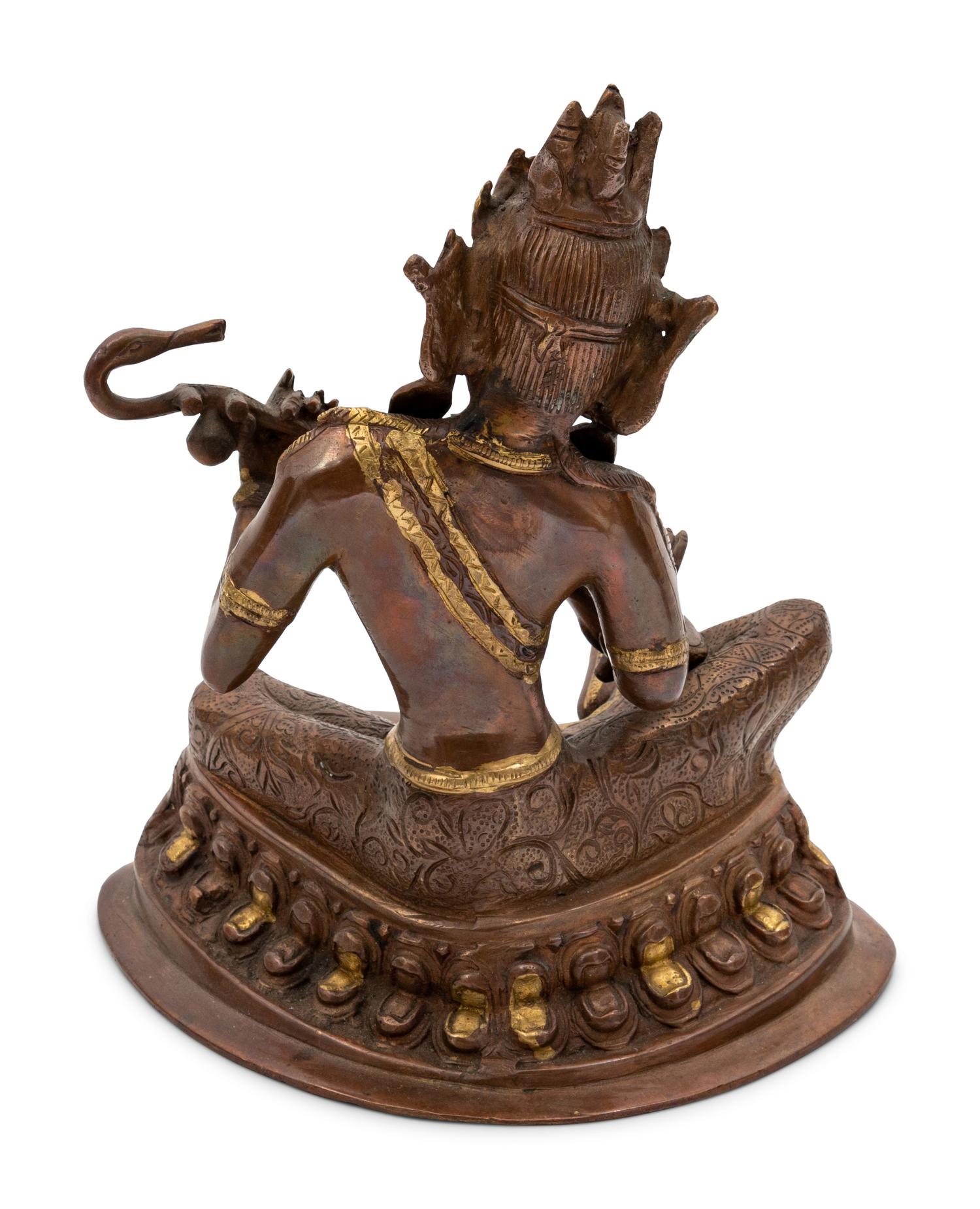 A Patinated Bronze Sculpture of Saraswati