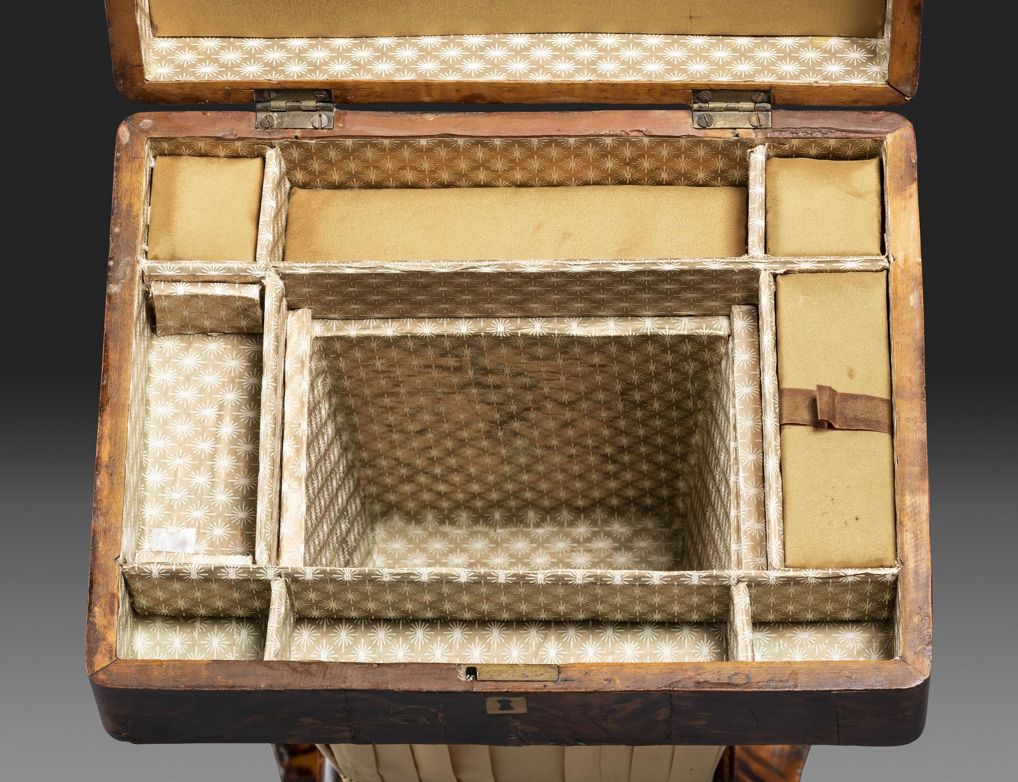 A Regency Tortoiseshell Veneered Sewing Table