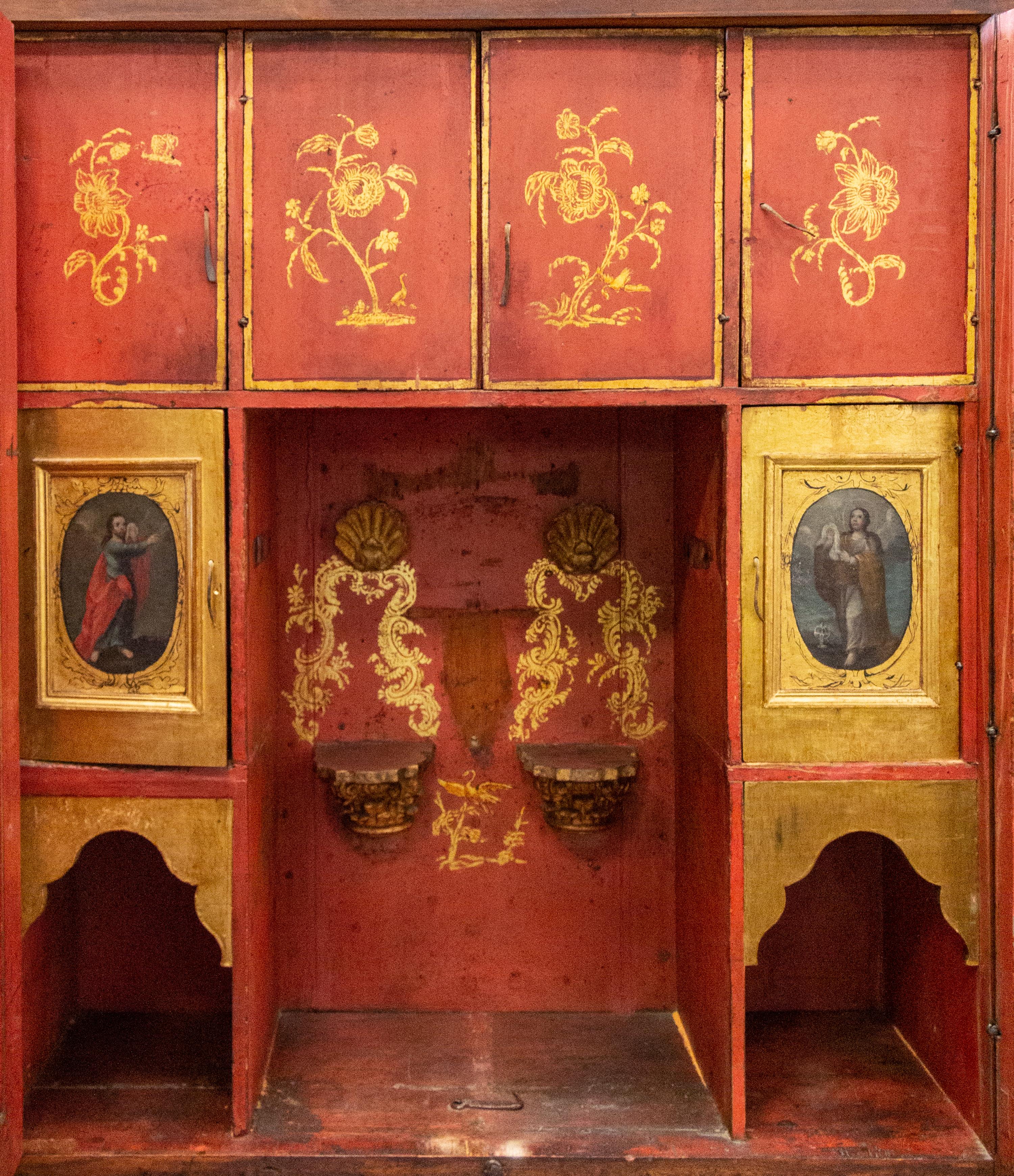 A Spanish Colonial Style Painted and Parcel Gilt Armoire