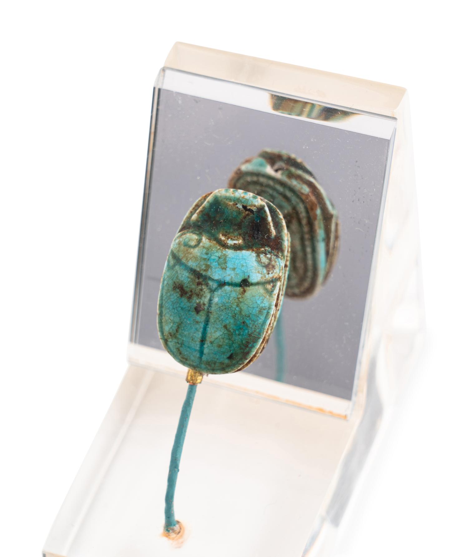 An Egyptian Faience Swivel Scarab