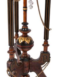 A Pair of Victorian Part-Ebonized and Gilt Walnut Plant Stands