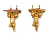 A Pair of Carved Giltwood Putti Wall Brackets