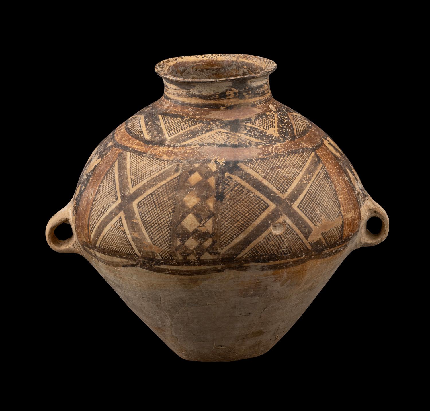A Chinese Painted Pottery Handled Jar