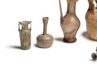 A Group of Nine Roman, Sidonian, and Islamic Glass Vessels