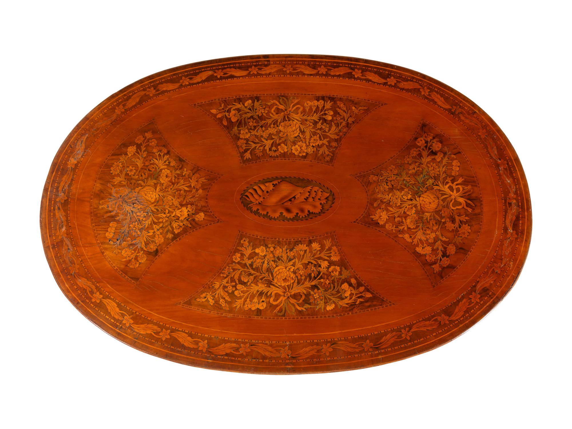 A Continental Marquetry Center Table