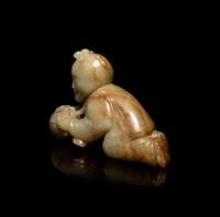 A Chinese Russet and Pale Celadon Jade Figure of a Boy