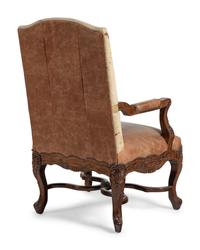 A Pair of Louis XV Style Carved Walnut Fauteuils
