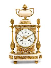 A French Gilt Bronze and Marble Clock