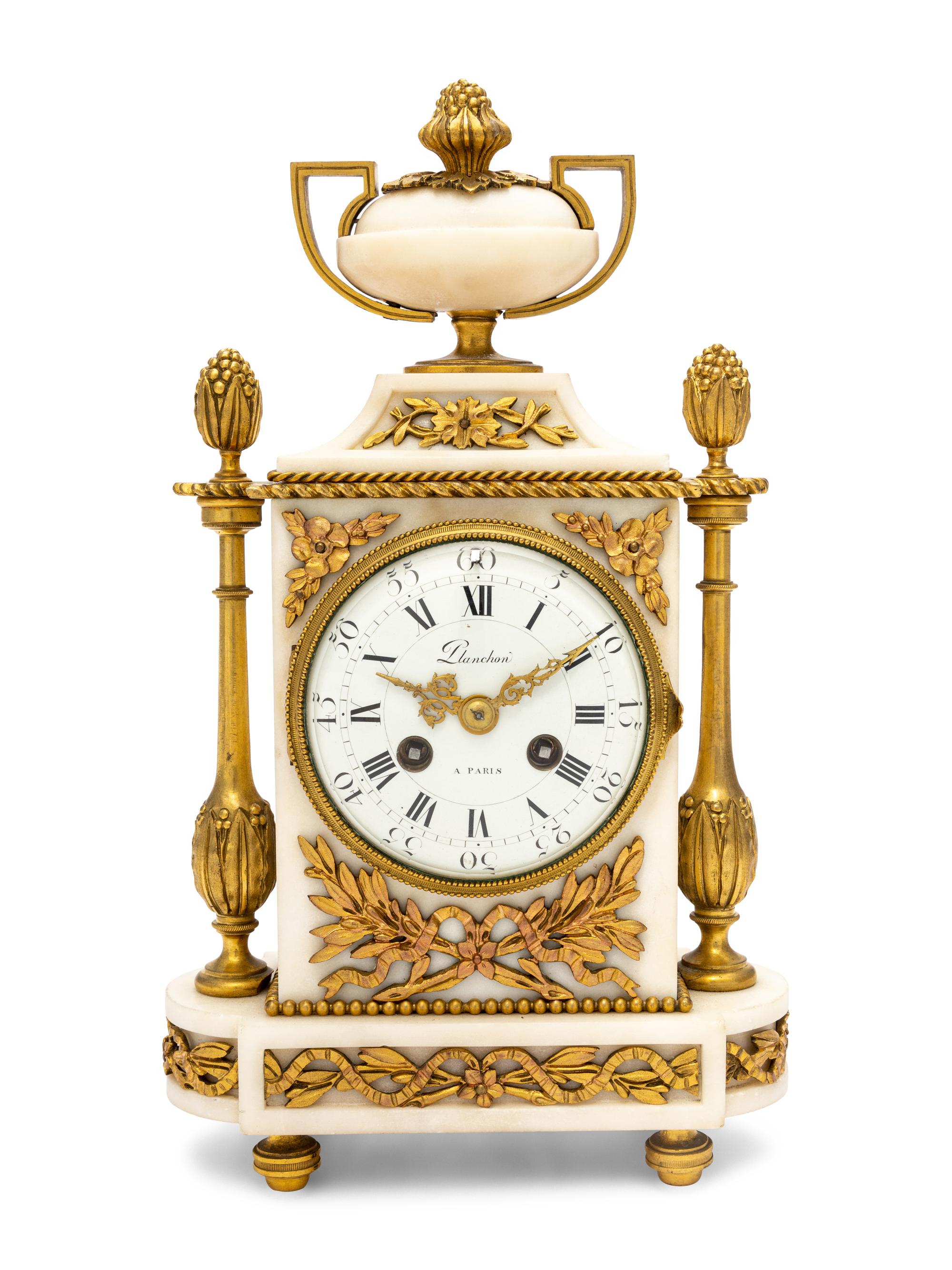A French Gilt Bronze and Marble Clock