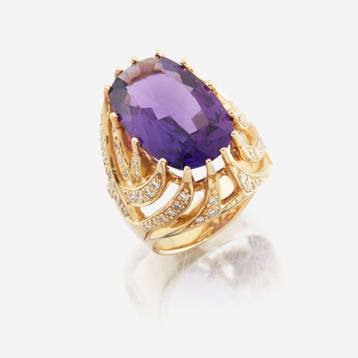 An amethyst, diamond, and gold ring