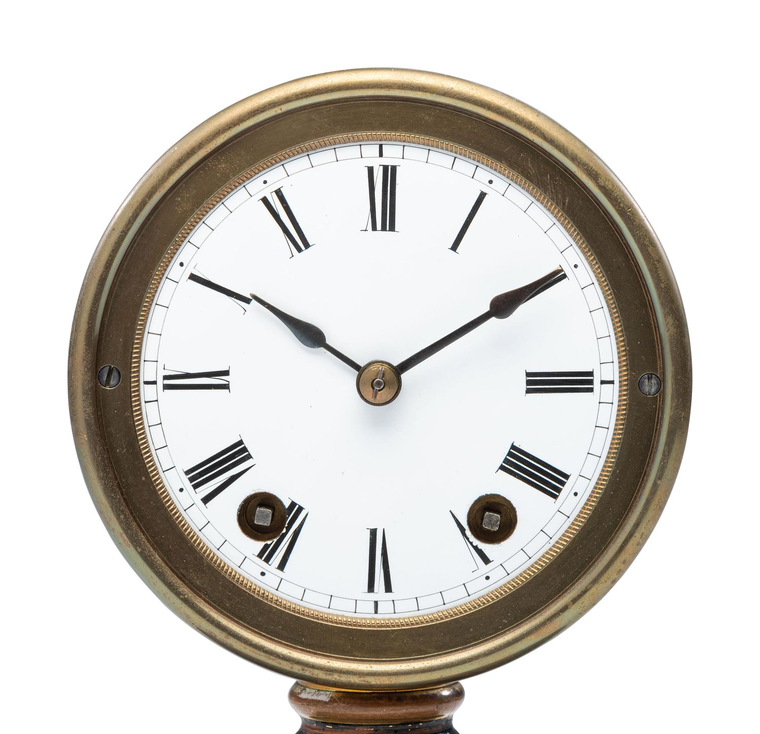 An Ebonized and Parcel Gilt Mantel Clock