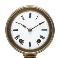 An Ebonized and Parcel Gilt Mantel Clock