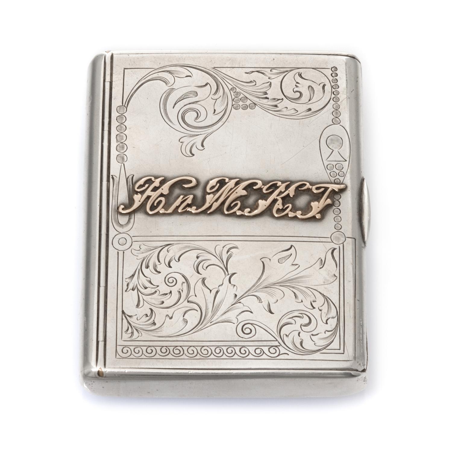 A Russian Silver Cigarette Case, Mark of I.P. Khlebnikov with Imperial warrant, Moscow, late 19th/early 20th century, the lid with an a