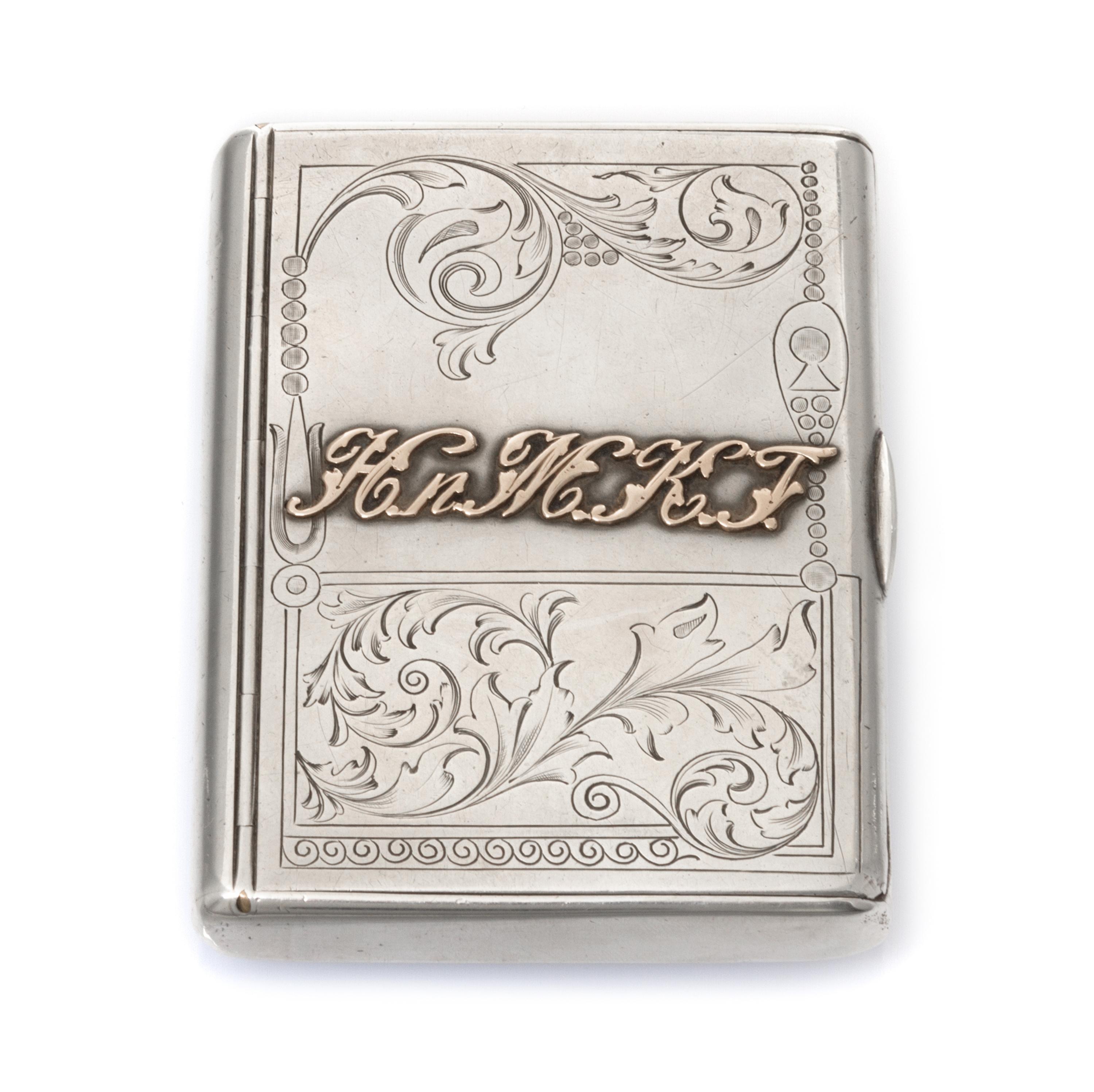 A Russian Silver Cigarette Case, Mark of I.P. Khlebnikov with Imperial warrant, Moscow, late 19th/early 20th century, the lid with an a